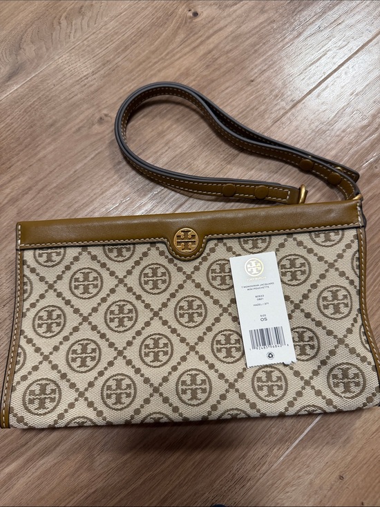 Tory Burch Handbags - Tory Burch Beige Monogram multi use wristlet